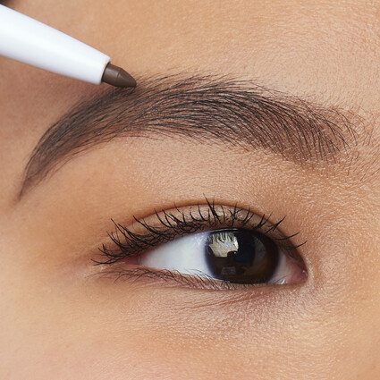 Model Applying Eyebrow Pencil