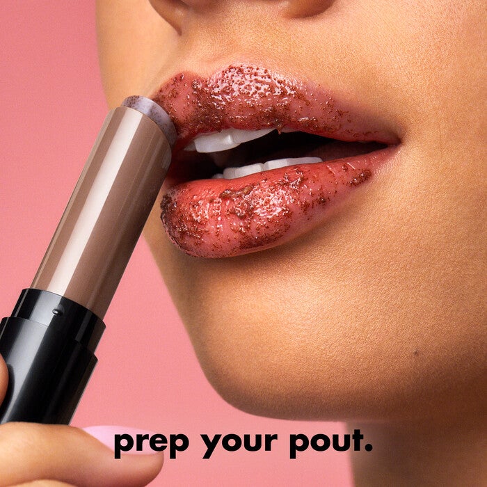 Model Applying e.l.f.'s Sugar Lip Scrub