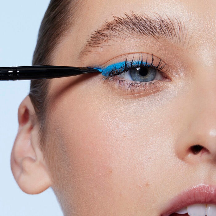 Model Using the Wing It Liner Brush to Create a Wing