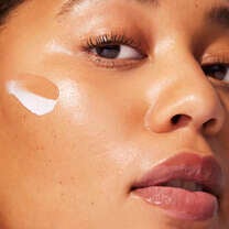 Apply Bronzing Drops with Face Cream