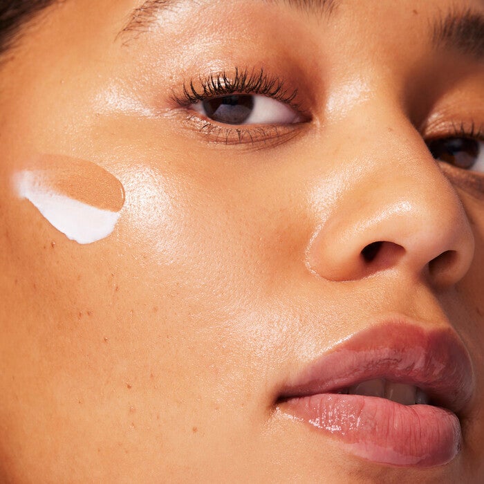 Apply Bronzing Drops with Face Cream