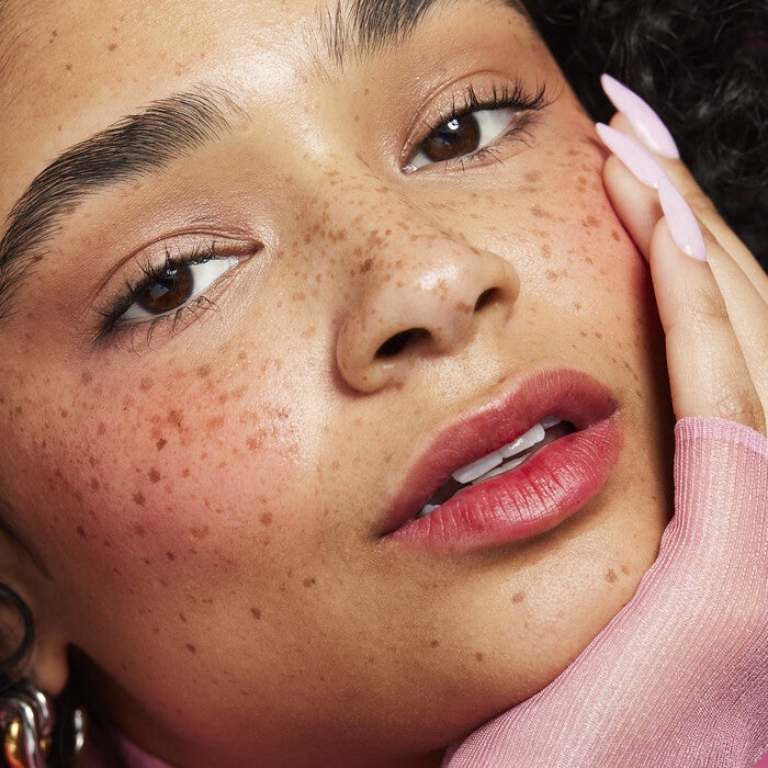 Model Wearing Incredi-Curl Volumizing and Curling Mascara