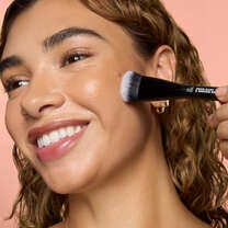 Model Applying Makeup Using the Cream Blush and Bronzer Duo Makeup Brush