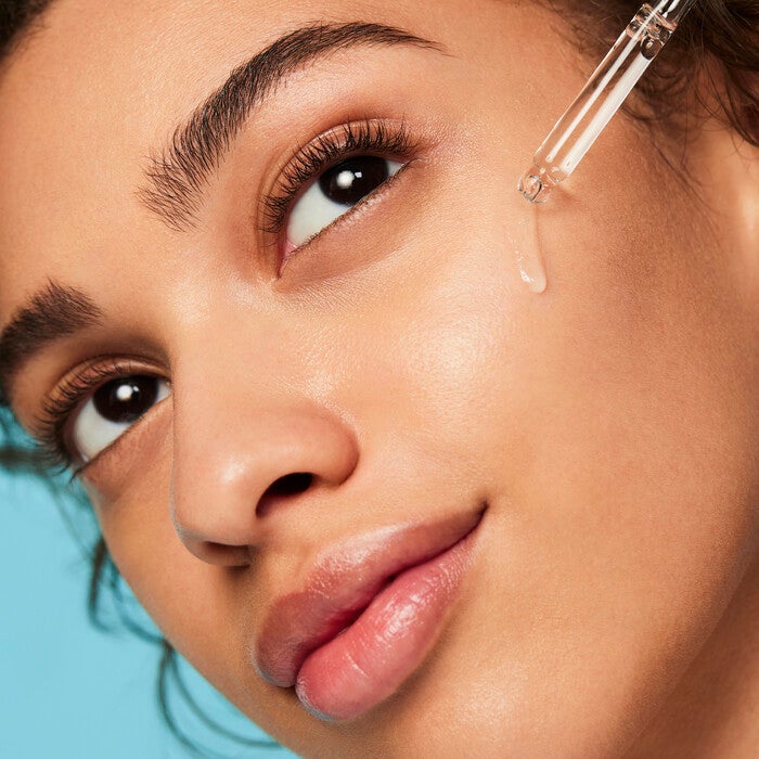 Applying Triple Bounce Face Serum