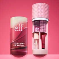 Inside of (s)e.l.f. Made Lip Balm Kit Packaging w/ Empty Bottle, Lip Balm and Gems