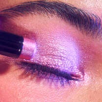Applying Lavish Affair Purple Eyeshadow Stick