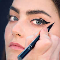Model Applying Waterproof Eyeliner Pen