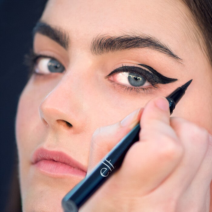 Model Applying Waterproof Eyeliner Pen