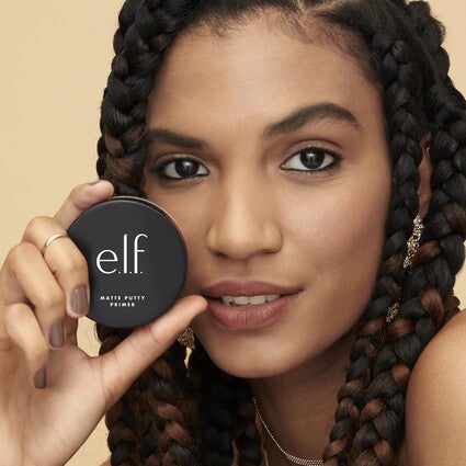 Model Wearing Mattifying Face Primer